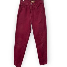 Great pair of vintage burgundy red jeans. Front and back pockets with zipper and button closure. The pants are just simply amazing. Straight leg! Disclosure: There is some slight wash wear and discoloration on the jeans that have been pictured. Does not take away from the pants, but please reference imperfections before ordering. Measurements approximately and unstretched (measurements taken flat aka side to side or up and down):         Brand:  GUESS JEANS Size: Tagged 28 Material: 100% cotton Machine wash cold Made in the USA Hip flat: 17 inches Waist flat: 13 inches Inseam: 29 inches Rise: 12 inches Features : - VINTAGE JEANS - VINTAGE - VINTAGE DENIM - GUESS - STRAIGHT LEG - RETRO - STYLE # 43050ARG - AMERICAN TRADITION - RN#62136 - TRIANGLE PATCH - BERRY FUSCHIA - MOM JEANS - 1980s - High Waist Burgundy Cotton Pants, Casual Burgundy Straight Leg Jeans, Vintage Red Pants For Fall, Red Vintage Bottoms For Fall, Burgundy Straight Leg Bottoms With Pockets, Burgundy Straight Leg Cotton Jeans, Burgundy Cotton Straight Leg Jeans, Burgundy Cotton Jeans For Fall, Vintage Red Pants With Pockets