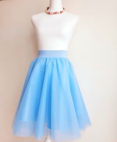 "❤ MADE ESPECIALLY FOR YOU Our light blue tutu tulle skirt is made to order to your specific measurements. Please check chart size below before placing your order or contact me for any detail. ❤ DETAILS -> fully SEWN tutu, it is NOT tied or knotted -> soft tulle fabric -> lining silk saten -> elastic waistband -> 6 layers of tulle, plus lining -> not see through Manual wash 40 \" Do not dry in drying machine Iron only the lining Dry on a hanger ❤ PROCESSING TIME: Your product will ship within 7- Blue Tulle Party Bottoms, Blue Flared Tulle Skirt, Blue Tulle Bottoms For Spring, Blue Full Tulle Skirt, Spring Blue Tulle Bottoms, Blue Tulle Skirt For Summer, Blue Summer Party Petticoat, Fitted Blue Tulle Petticoat, Blue Fitted Tulle Petticoat