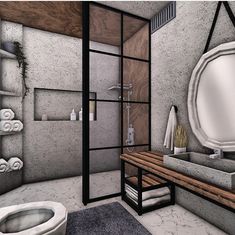 a bathroom with a sink, toilet and shower stall in the background is a large mirror