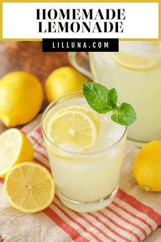 homemade lemonade in a glass next to sliced lemons on a striped towel with text overlay