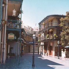 an old fashioned street scene with buildings on both sides