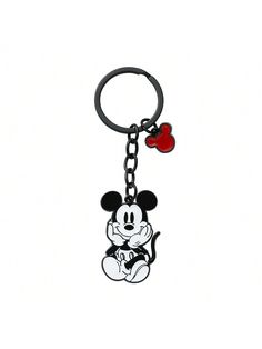 a mickey mouse keychain with a heart on it