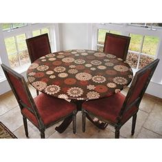 a round table with four chairs around it