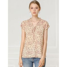 Lightweight and breezy, the shirt is perfect for sunshine styling. A floral print updates this top, perfect for adding a summer pattern to warm-weather looks. Made of a lightweight fabric, the printed style has a self-tie decor at the neckline and a ruffled trim. It has a loose fit that falls to the hip, so you can easily tuck it into skirts or jeans. Street Style Parisian, Chiffon Shorts, Floral Print Chiffon, Ditsy Floral Print, Chiffon Ruffle, Ruffle Shorts, Groom Style, Floral Print Blouses, Floral Chiffon