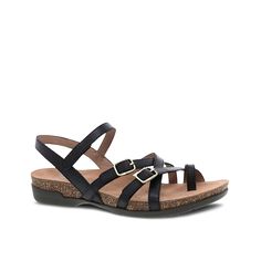 Dansko-Roslyn Sandal Add pizzazz to your summer adventures with the Dansko Roslyn sandal. Crisscross straps with dual buckles on the vamp offer a cagey look while the textured cork midsole provides shock absorption and support. Black Cork Sandals With Buckle Closure, Black Cork Footbed Sandals For Summer, Summer Black Cork Footbed Sandals, Spring Cork Sandals With Buckle Closure, Spring Cork Footbed Sandals With Buckle Closure, The Vamp, Summer Adventures, The Vamps, Black Sandals