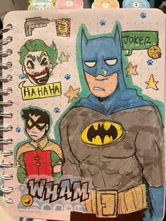 a drawing of batman and joker in the style of comic book character art on a spiral notebook