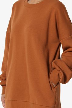 A cozy, fleece piece in a loose, hip length back design for a must-have casual look. Sweatshirt that keeps you comfy with soft fleece fabric, a loose fit and an easy-to-pair solid color. Pair it with jeans or leggings for a relaxed vibe.Crew neck boyfriend sweatshirts, Hi low hem(Front 27in, Back 30in-Measured from size Small)Long, slouched sleeves, Ribbed trim, Oversized fitEssential for work, play, or just simple relaxing and layer with our patching pantsFits true to US size, take your normal Brown Long Sleeve Sweats For Fall, Basic Drop Shoulder Sweats For Fall, Cozy Fit Brown Sweatshirt With Ribbed Cuffs, Relaxed Fit Long Sleeve Sweatshirt Dress For Loungewear, Comfy Soft Texture Hoodie For Fall, Comfy Hoodie With Soft Texture For Fall, Relaxed Fit Sweats With Soft Texture For Fall, Comfortable French Terry Sweater For Fall, Comfy Long Sleeve Soft Sweats