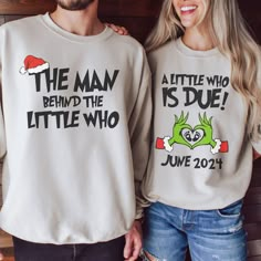 two people wearing matching christmas sweaters with the words, the man behind the little who