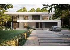 a car is parked in front of a modern house