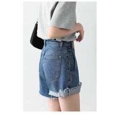 Unleash Your Streetwear Style with Retro Elegance Elevate your fashion game with our Women's Denim Shorts - a perfect blend of retro charm and contemporary style. These Irregularly Cut Blue High-waisted Short Jeans are designed for the modern woman who appreciates a touch of nostalgia in her wardrobe. Key Features: Retro Vibes: Embrace the timeless appeal of retro fashion with these irregularly cut high-waisted shorts, bringing a classic touch to your streetwear ensemble. Comfort Redefined: Crafted from denim cotton fabric, these shorts offer a comfortable and breathable fit. The fabric is skin-friendly, ensuring you stay cool and stylish all day long. Textured Elegance: The retro wash with texture adds depth to the design, giving your shorts a unique and fashionable look that stands out f Trendy Jean Shorts With Belt Loops, Chic Short Blue Jeans, Chic Short-cut Blue Jeans, Trendy High Waist Denim Blue Bottoms, Trendy High Waist Dark Wash Bottoms, Chic Blue Jeans With Short Length, Chic Blue Short Length Jeans, Chic Short Length Blue Jeans, Retro High Waist Denim Bottoms