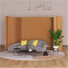 a living room with a couch, table and potted plant on the floor in front of a wooden paneled wall