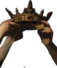 two hands holding up a golden crown on top of each other's head,