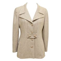 GUARANTEED AUTHENTIC CLASSIC VINTAGE CHANEL WOOL BLEND BLAZER Collector's Piece! • Design: - Single breasted 4 button stunning fit jacket. - Beautiful in a light beige and cream. - Vertical slash pockets. - Front and rear of jacket there is a button flap. - Cuffs have 4 working buttons. - All buttons are round with CC logo engraved. - Fully lined in signature CC silk blend. - Rare find! • Size: 36 • Material: 60% Wool, 20% Nylon, 20% Mohair; 95% Silk, 5% Spandex Lining • Measurements (Approximate laid flat): - Shoulder to Shoulder: 15" - Underarm to Underarm: 18.5" - Sleeve Length: 23.5" - Total Length: 29.25" (tip of collar to hem) • Condition: Excellent - Excellent vintage condition. - Minor small wear to fabric by back seam near rear flap, can be mended nicely by seamstress. - No signs Vintage Chanel Jacket, Chanel Blazer, Lambskin Coat, Chanel Jacket, Beige Blazer, Beige Jacket, Blazer Beige, Blazer Designs, Basic Jackets