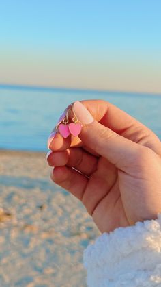 Dainty pink, pearl white, or light turquoise enamel 18k gold plated heart charms on gold french wire or huggy earrings. MATERIALS 14k gold plated brass base premium metal 18k gold-filled (hypoallergenic) Pink Heart Beads Drop Earrings, Hypoallergenic Pink 14k Gold Filled Jewelry, Pink Heart Beads Dangle Jewelry, Pink Nickel-free Double Heart Earrings, Dainty Pink Jewelry With Dangling Charms, Pink Heart Earrings With Ear Wire For Valentine's Day, Pink Heart-shaped Nickel-free Earrings, Pink Nickel-free Heart Earrings For Valentine's Day, Pink 14k Gold Filled Dangle Jewelry