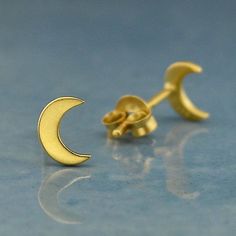 These moon post earrings make a perfect gift for any stargazer. These moon earrings feature a crisp ridge along the center which gives this piece extra depth and dimension, reminiscent of the moon on a clear, dark night. Because of its association with and symbolism for growth, the "crescent" became known as a symbol for fertility, and goddesses like Aphrodite are often depicted wearing a hair ornament in the shape of a crescent moon. Available in Sterling Silver, 14k Shiny Gold Plated, 18K Rose Moon Earrings Gold, Moon Earrings Studs, Moon Stud Earrings, Moon Studs, Monogram Jewelry, Bronze Pendant, Silver Moon, Birthstone Charms, Moon Earrings