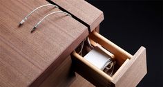 an open drawer with some wires in it