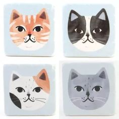 four square coasters with cats painted on them