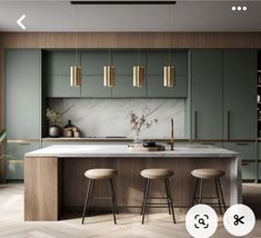 an image of a kitchen setting with stools and counter top in front of the island