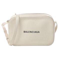 This shoulder bag is constructed of soft calfskin leather in white. The handbag features a rear patch pocket, Balenciaga logo in white and has a thin adjustable leather strap. The bag with is finished with a black leather interior. COLOR: White MATERIAL: Calfskin leather ITEM CODE: 552370 MEASURES: H 6.25” x L 9.25” x D 2.25” DROP: 20.25” EST. RETIAL: $1695 COMES WITH: Dust bag CONDITION: Very good - slight signs of wear to interior and with minor discolouration at zipper. Made in Italy Vintage Balenciaga, Cristobal Balenciaga, Balenciaga Logo, City Bag, Interior Color, D 2, Leather Items, Leather Interior, White Bag