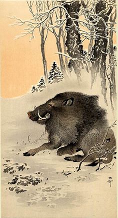 an animal is sitting in the snow by some trees and bushes, while another animal has it's mouth open