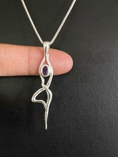 "GENUINE AMETHYST YOGA NECKLACE Minimalist Sterling Silver Natural Amethyst YOGA Pendant Necklace NECKLACE FEATURES: Metal: All components are made from solid .925 Sterling Silver Model is wearing 16\" in length solid .925 Sterling Silver Chain Length available: 16\", 18\" or 20\" Measurement: Natural Amethyst Yoga Pendant Height: 44MM, not including bail Width: 8MM Please visit my storefront to view more of my creations: vonzjewel.etsy.com Thanks a lot for stopping by and supporting my boutique Workout Jewelry, Yoga Pendant, February Birthstone Jewelry, Minimalistic Jewelry, Fitness Jewelry, Jewelry Minimal, Yoga Necklace, Thanks A Lot, Yoga Jewelry