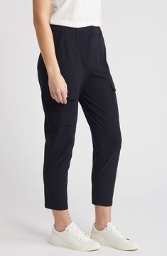 Soft and ultrastretchy fabric means all-day comfort in these relaxed-fit cargo pants boasting a breezy cropped fit and a plethora of handy pockets. 26" inseam; 13" leg opening;10 3/4" front rise; 15" back rise (size Medium) Zip fly with hook-and-bar closure Front slant pockets; cargo flap-patch pockets 68% nylon, 32% elastane Machine wash, line dry Imported Functional Cargo Pants With Multiple Pockets For Work, Functional Cargo Pants With Cargo Pockets For Work, Functional 4-way Stretch Bottoms With Cargo Pockets, Sporty Cargo Pants With Multiple Pockets For Work, Sporty Cargo Pants With Side Pockets For Work, Sporty Tapered Leg Cargo Pants For Work, Sporty Relaxed Fit Cargo Pants For Work, Athleisure Workwear Bottoms With Pockets, Athleisure Bottoms With Pockets For Work