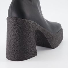 • Zip closure
 • Square toe
 • Textured platform sole
 • Solid color
 • Thick block heel Black Platform Ankle Boots, Stella Mccartney Platform, Ankle Boots For Women, Fashion Enthusiast, Platform Ankle Boots, Black Platform, Boots For Women, Womens Boots Ankle, The Chic