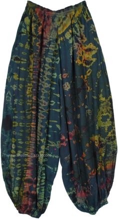 These harem-style pants feature a distinctive tie-dye pattern, combining deep greens, teal blues, and hints of red and yellow for a vibrant look.  Made from soft, breathable rayon, these pants offer a relaxed and comfortable fit, perfect for casual wear. #tlb #SplitSkirtsPants #TieDye #bohemianfashion #hippieloungepants Green Bohemian Harem Pants With Loosely Fitted Hips, Bohemian Green Harem Pants With Loose Fit, Green Bohemian Harem Pants, Green Harem Pants For Festival, Tie Dye Clothes, Tie Dye Harem Pants, Green Clothing, Simple Tank Tops, Bohemian Pants