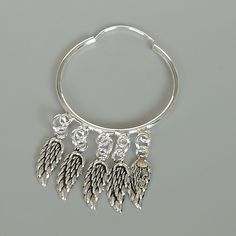 A PAIR of 30mm sterling silver hoops with dangling angel wings charms. Dimension: Hoop- 1.5 x 30 mm Charm- 18 x 5 mm Drop length: 55 mm Weight: 5.8gm Price is for ONE PAIR. These earrings are made of 925 hypoallergenic sterling silver. Most of my pieces come with a 925 stamp. Can be packaged in a gift box. I can include a personal message from you if needed You are welcome to contact me at... bhavnakwintra1956@gmail.com For more beautiful pieces from my shop, please browse 👇 TOE RINGS: https:// Silver Charm Hoop Earrings, Silver Dangle Hoop Earrings With Charms, Silver Small Hoop Earrings With Charms, Silver Sterling Silver Charm Hoop Earrings, Silver Sterling Silver Hoop Earrings With Charms, Sterling Silver Hoop Earrings With Charms, Nickel-free Silver Winged Jewelry, Tiny Hoop Earrings, Hoop Charms