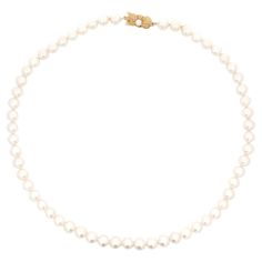 Each of Mikimoto's cultured pearl strands are a work of art born from the mystery of the sea. Creation of these strands requires incredible skill, judgment and craftsmanship. The journey begins with a rigorous selection process, culling the very best quality pearls. This 18” Akoya cultured pearl strand features 7 mm Akoya cultured pearls with a Mikimoto signature clasp in 18K yellow gold. Give the gift of a lifetime with nature's most precious jewel. Legendary quality and style since 1893, Mikimoto jewels are objects of desire to cherish today and for generations to come. The necklace weighs 33.3 grams. The necklace is hallmarked "M" and stamped "750". The necklace is vintage in excellent condition. Necklace Specifications: Designer: Mikimoto Metal: 18k Yellow Gold Pearl Type: Akoya Cultur Timeless Single Strand Akoya Pearl Necklace, Timeless Single-strand Akoya Pearl Necklace, Luxury Pearl Necklace With 17 Jewels, Classic Yellow Gold Beaded Necklaces, Luxury Single Strand Yellow Gold Pearl Necklace, Fine Jewelry Akoya Pearl Necklace With 17 Jewels, Luxury High Luster Akoya Pearl Necklace, Luxury Pearl Pendant Necklace With Round Beads, Luxury Pearl Necklace With Round Beads And Pearl Charm