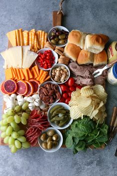 a table topped with lots of different types of food