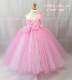 Beautiful Full Length 3 Tone Pink Tutu Dress This gorgeous Full Length 3 Tone Pink Tutu Dress as been made with 3 layers of top quality soft tulle, with a high waistline in a 3 tone pink colour, tulle flowers complete with gems to give the dress an elegant look & a big beautiful bow giving the finishing touches which any princess would love!  This stunning tutu dress is perfect for any occasion! All our lovely tutu dresses come with care instructions & are CE & UKCA Tested. All our beautiful creations are made to order. PLEASE BE AWARE that gems may vary in colour and shades of tulle may slightly differ from those illustrated due to the dying process Your very welcome to follow us on our Facebook, Instagram, Twitter, Tiktok & Pinterest pages by following the links via our Etsy shop! Thank 1st Birthday Gift Ideas, Simple Flower Girl Dresses, Baby 1st Birthday Gift, Pink Tutu Skirt, 1st Birthday Dresses, Pink Tutu Dress, Mode Rose, Fancy Dress Party, Angel Dress