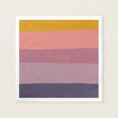 a square card with the word, ollivia on it in gold foil and multi - colored stripes