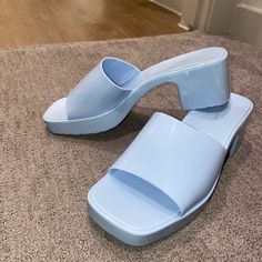 Never Worn. Will Fit 7-7.5 Perfectly, Jelly Sandal With 2 In. Heel I Think Light Blue Round Toe Casual Heels, Blue Flat Platform Sandals, Casual Light Blue Summer Heels, Blue High Heel Synthetic Mules, Trendy Blue Open Toe Mules, Blue Slip-on Jelly Sandals For Summer, Blue Platform Mules For Summer, Trendy Blue Slip-on Mules, Trendy Light Blue Sandals With Round Toe