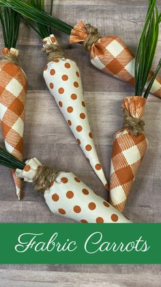 fabric carrots are arranged in the shape of a heart on a wooden surface with text overlay that says fabric carrots