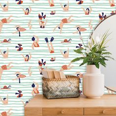 the wallpaper is colorful and has different designs on it, including people in bathing suits