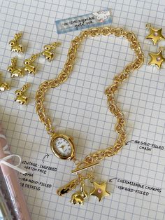 Equal parts statement-making & unique ౨ৎ Meet the 'ON TIME' necklace - featuring the most precious charms paired alongside a vintage-inspired watch face, this accessory is bound to become a treasured piece in your jewelry collection. Pick 3 of your favorite charms to create a truly one-of-a-kind piece and make it your own! ☆ 3 charm maximum ☆ Made with 18K gold filled chain and pendants - waterproof & tarnish resistant ☆ Working battery powered watch face (battery included) ☆ Available in length Watch Charms Hanging Gold, Whimsical Gold Vintage Charm Necklace, Vintage Gold-plated Tarnish-resistant Charm Necklaces, Gold Vintage Tarnish-resistant Charm Necklace, Gold-tone Brass Necklaces With Vintage Charm, Time Necklace, Clock Necklace, Pick 3, Jewelry Choker