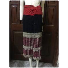 Vintage tribal Tho women tube skirt. Age is over 30 years and there are few places with repaired that you can see in the pictures. This is made from indigo natural dyed cotton with supplementary silk threads and wrapped around the waist,without tailoring or pleating to fit the waist. Normally,Skirt is typically made up of three parts:the lower part and skirt body is together and cotton red top .This is famous design from Tho,characteristics of the art is different with other group.They used embr Laos Country, Tube Skirt, Red Top, Silk Thread, Laos, 30 Years, Trousers Women, Hand Embroidered, Looks Great