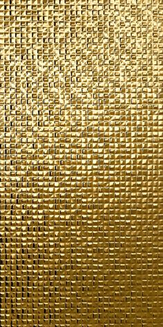 a gold textured background that looks like it has been made out of metal foil