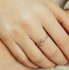 Handmade lavender flower ring set with 8 natural purple amethyst stones which represents the lavender color in nature, the lavender flower is known to represent purity, silence, devotion serenity, grace, and calmness. This Unique ring is available also in 14K white or rose gold. The perfect wedding, anniversary, or birthday gift for your loved ones. Features: ❇ Band: 14K white gold- Can be made also in 18K - contact me for details. ❇ Avilable also in Yellow / Rose Gold. ❇ Band Width: 1.5-2mm / 0 Lavender Multi-stone Ring For Gift, Lavender Multi-stone Rings For Gifts, Lavender Engagement Ring, Lavender Ring, Memory Ring, Lavender Leaves, Diamond Alternative Engagement Ring, Purple Rings, Etsy Gold Ring