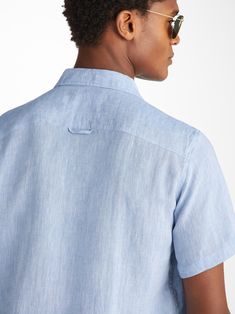 The Monaco short sleeve shirt features a curved back yoke with a box-pleat for comfort and a curved hem with side vents for ease of movement. We've used the classic styling of a button-through front and cuffs, a 2-piece collar and for a modern addition, we've added a U-shaped breast pocket with a handy sunglass loop for effortless summer chic. For a final touch of luxe, the shirt is finished with mother of pearl buttons throughout and our minimalist rose logo label at the hem. There's also a han Short Sleeve Shirt With Concealed Placket For Work, Spring Short Sleeve Top With Concealed Placket, Classic Short Sleeve Shirt With Welt Pockets, Business Casual Short Sleeve Tops With Pockets, Classic Short Sleeve Tops With Welt Pockets, Modern Short Sleeve Shirt For Daywear, Casual Short Sleeve Shirt With Concealed Placket, Casual Summer Tops With Concealed Placket, Summer Tops With Concealed Placket