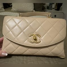 Small 2019 Trendy Spirit Bag In Excellent Condition. Size: 4.7 X 7.9 X 3.1 With A 19.75 Inch Drop. Color Is Beige With A Slight Blush Undertone. High-end Beige Handheld Box Bag, Beige Bag With Dust Bag For Everyday Luxury, Elegant Handheld Flap Bag With Dust Bag, Beige Top Handle Shoulder Bag For Everyday Luxury, Designer Beige Handheld Box Bag, High-end Cream Top Handle Bag, Luxury Handheld Clutch For Daily Use, Handheld Flap Bag With Dust Bag For Formal Occasions, Luxury Handheld Flap Bag With Top Carry Handle