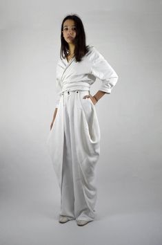 Balmorra Pants | NOT JUST A LABEL White Bottoms With Belt Detail For Spring, White Straight Pants With Belt Loops, White Belted Wide-leg Bottoms, White Belted High-waisted Pants, White Belted Wide Leg Bottoms, Chic White Bottoms With Belt, White Chic Bottoms With Side Pockets, Chic White Bottoms With Side Pockets, White Belted Pants For Work