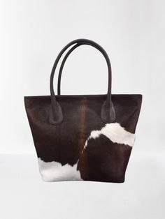 Light Weight Women's Cowhide Leather Tote Bag - Handmade - Large size tote bag - Spacious, durable and light weighted - 100% Genuine leather & real cowhide - Customization | Personalization option available Dimension : Width x Height x Depth x Top Handle 15.5" x 11.5" x 4" x 6" The Pictures in the listing is for reference only. Each cowhide is unique in its colour and texture. The bag you'll receive will be similar in colour and texture with the picture shown in the listing. Custom Handbags, Cowhide Bag, Work Tote Bag, Work Tote, Weights For Women, Tote Bags Handmade, Shoulder Handbag, Large Tote Bag, Womens Tote