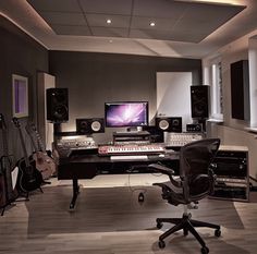 a home recording studio with lots of equipment