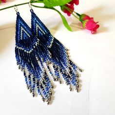 Luxury earrings.Very Long ,layered tassel earrings. Beaded earrings native American style. Fringe earrings. Seed Bead Earrings Boho earrings .Dark blue and silver color. Materials;These earrings were made of the Japanese beads and Czech crystals .sterling silver lever back. Earrings length 6 inches (17 cm) Bohemian Blue Beaded Earrings With Silver Beads, Silver Bohemian Tassel Earrings With Fringe, Blue Bohemian Beaded Fringe Earrings, Bohemian Blue Beaded Fringe Earrings, Blue Beaded Fringe Tassel Earrings For Festivals, Blue Bohemian Beaded Fringe Tassel Earrings, Bohemian Blue Tassel Chandelier Earrings, Blue Bohemian Tassel Earrings With Round Beads, Blue Bohemian Tassel Earrings With Dangling Beads