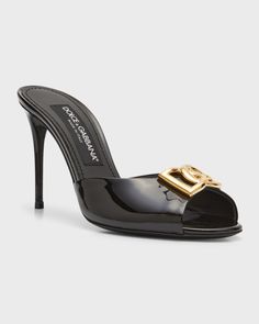 Dolce&Gabbana "Vernice" patent calf leather mule sandals with logo plate accent 3.25 in / 85 mm stiletto heel Open toe Slide style Leather outsole Lining: Leather Made in Italy Mule Sandals, Leather Mules, Stiletto Heel, Mule, Calf Leather, Neiman Marcus, Stiletto Heels, Open Toe, Dolce And Gabbana