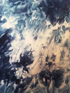 an abstract painting with black and white clouds in the sky, as seen from above