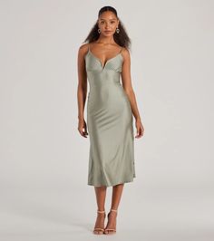 Raise a glass to your chicness in this sleeveless midi dress as a stunning wedding or party guest! The dress is designed with a wired V-neckline for a structured look, delicate spaghetti straps, and a flattering A-line silhouette that leads to the midi-length hem. Complete the look with earrings and heels.Fit & FeaturesSlinky knit fabric, moderate stretchSpaghetti strapsWired V-necklineA-Line silhouetteRuns true to size Dressy Dresses, Party Guests, Midi Dress Sleeveless, Midi Length, Spaghetti Strap, Knitted Fabric, Midi Dress, V Neck, Maxi Dress