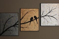 three paintings are hanging on the wall next to each other, one has a bird perched on a tree branch